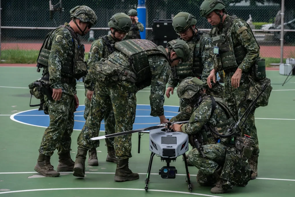 Members of Taiwan’s military operating a drone