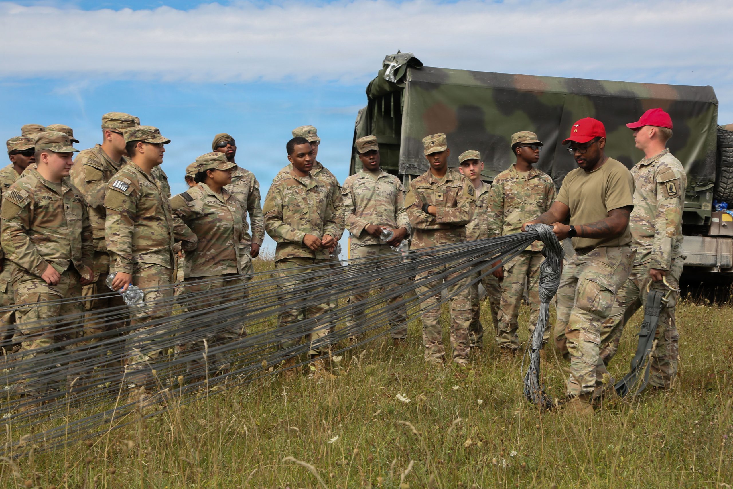 U.S. Army parachute riggers demonstrate parachute recovery techniques