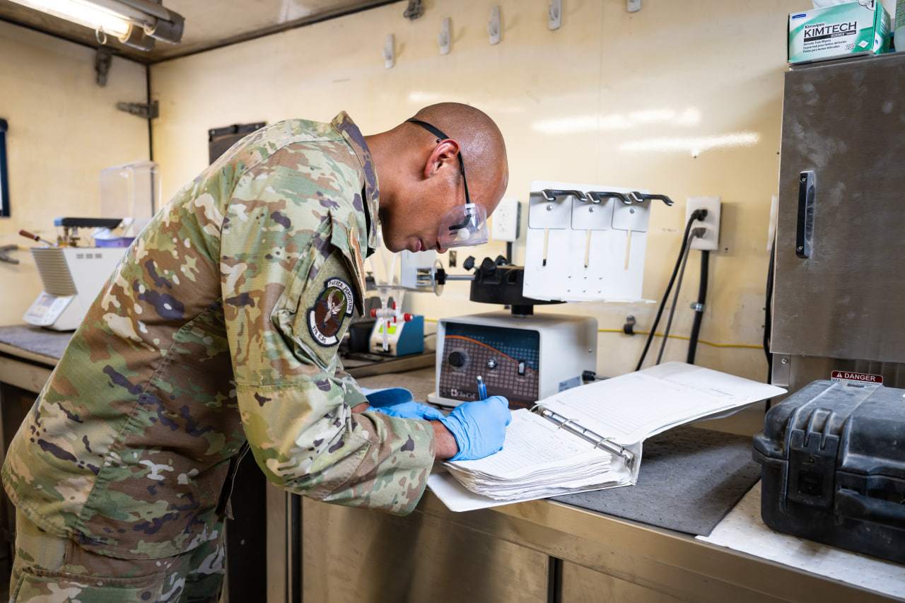 U.S. Air Force Staff Sgt. Fabian Pelayo documents fuel testing results in the 378th Expeditionary Logistics Readiness Squadron fuels lab