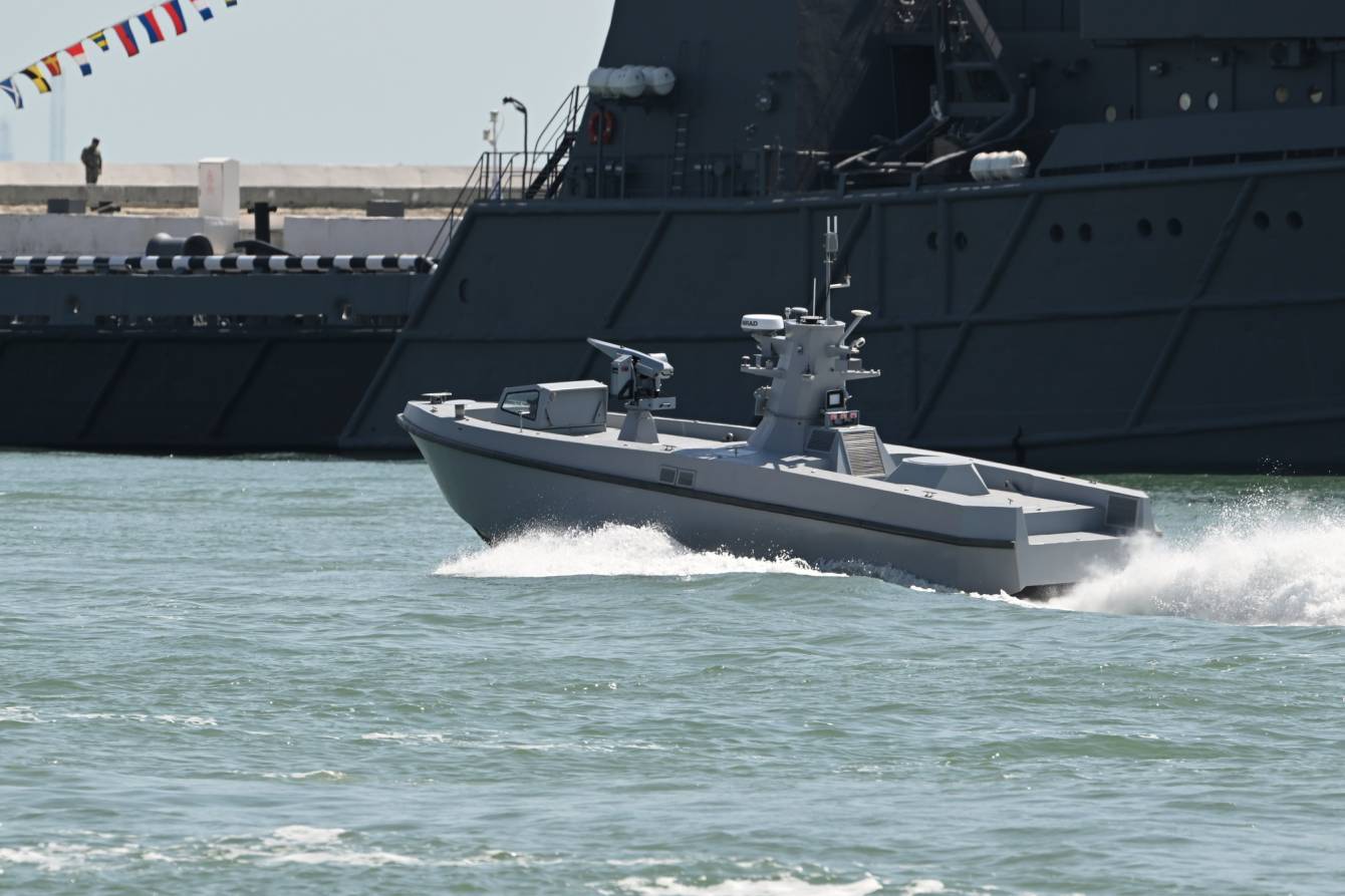 An armed unmanned surface vessel, likely the SALVO, during testing.
