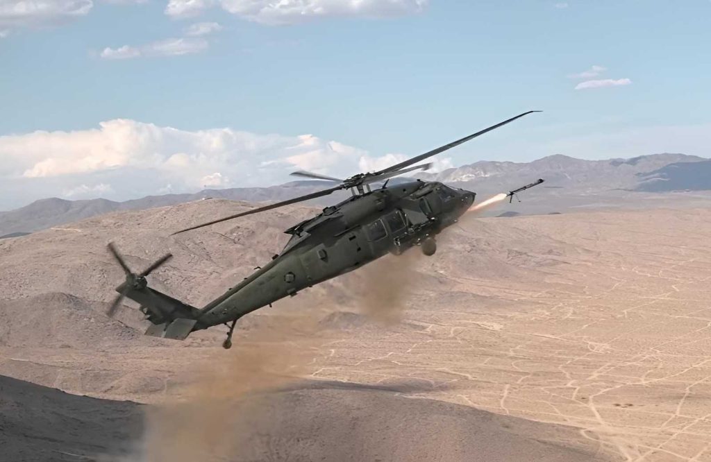 A Black Hawk helicopter launching Altius-700 drones from Anduril Industries.